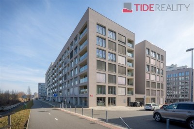 Modern apartment in Karlín with a balcony, river view, and a garage.